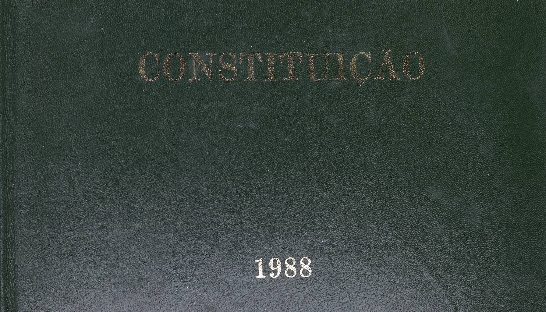 The bound cover of the 1988 Constitution: dark green leather, the word CONSTITUIÇÃO tooled in gold, the year below it.
